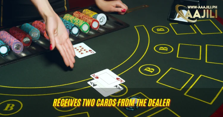 You will each player places their bets and receives two cards from the dealer